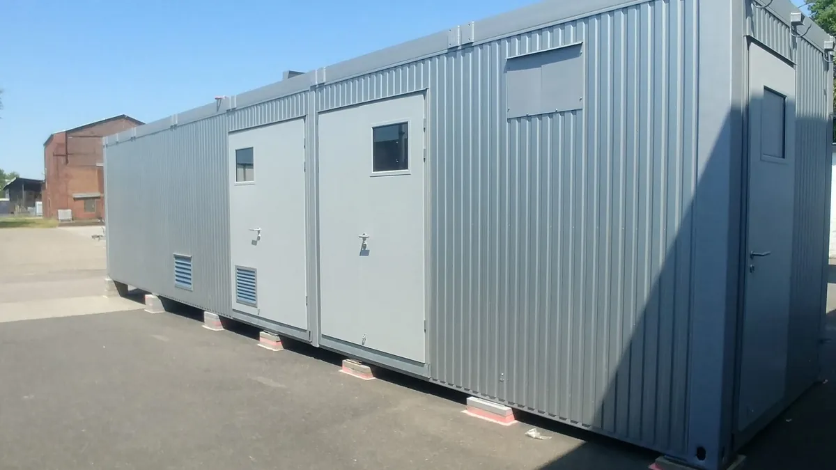 Finished electrolyser container installed outdoors at an industrial site, ready for long-duration operation